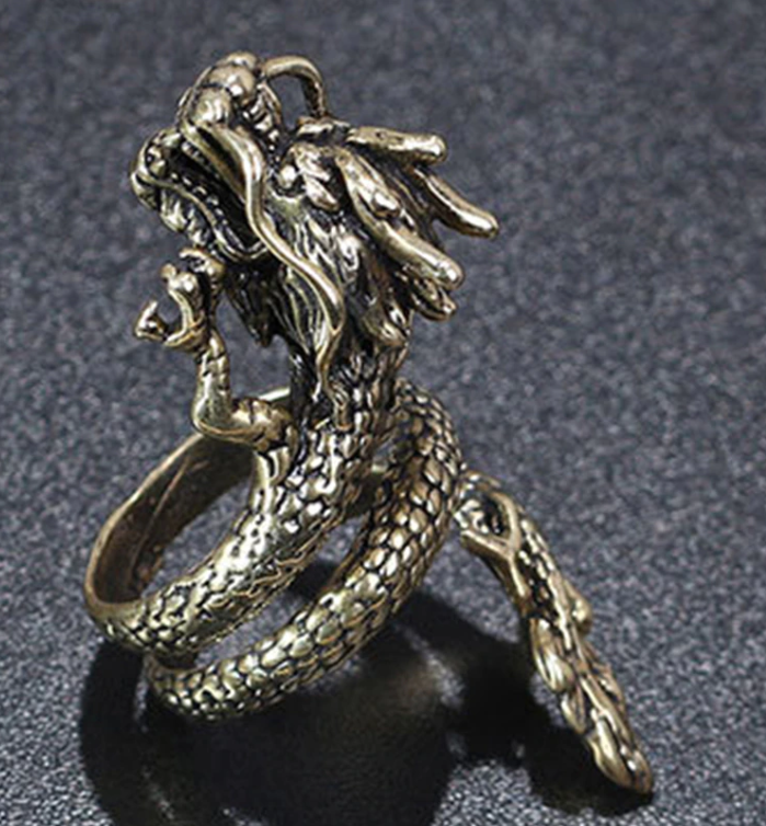 Zinc alloy gold colored dragon full finger ring. Ring is adjustable.