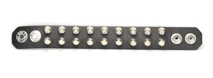 black leather bracelet with two rows of half inch silver spike studs showing snap closure
