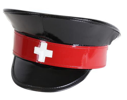 Black shiny patent vegan leather police hat. Front of hat has red strap across the front, with a white cross in the center of the red strap.