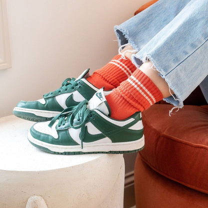 Coral Red Boyfriend Tube Socks with Green Nike Sneakers at Golden Rule Gallery in MPLS