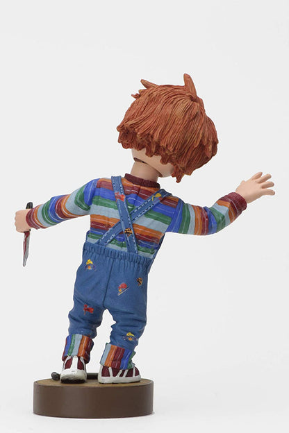 back of Head knocker bobble head of Chucky from Child's Play 2. Chucky has his right hand up, mouth open as if he is yelling, and in his left hand is clutching a knife. Chucky stands on a small round platform that reads "CHUCKY" in red letters on the front.