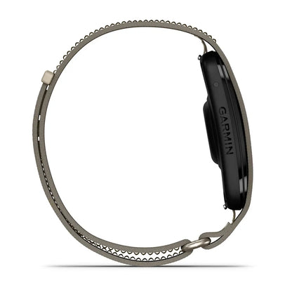 A side profile view of a Garmin smartwatch with a dark gray metallic loop band on a solid white background.