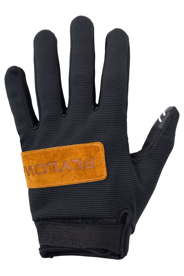 Black glove with orange Flylow logo on a white background
