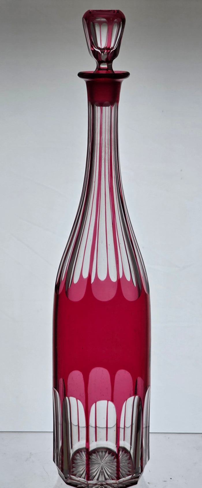 Hand Cut to clear cranberry decanter PA21
