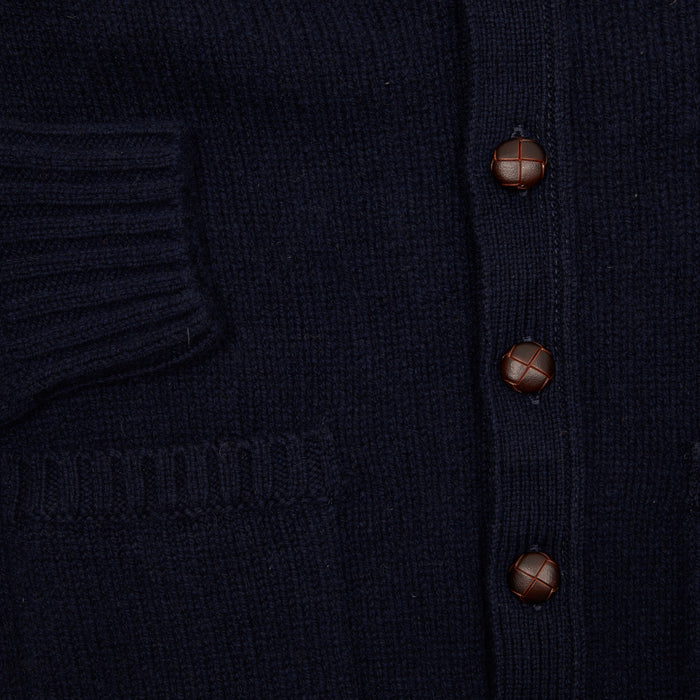Classic medium-weight cardigan in beautiful soft 100% lambswool spun by Todd & Duncan in Fife and knitted in Peterhead, Scotland.  Made in Scotland.