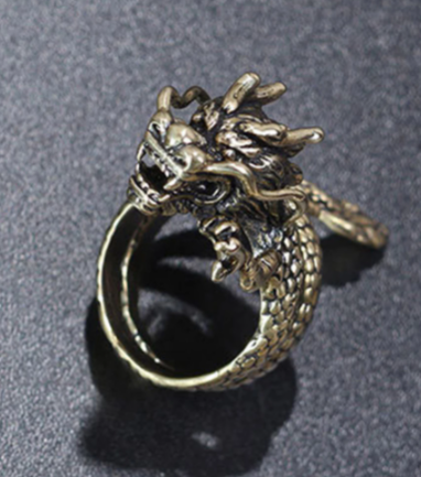 Zinc alloy gold colored dragon full finger ring. Ring is adjustable.
