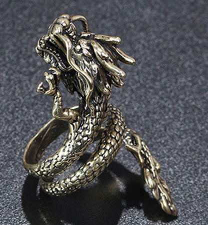Zinc alloy gold colored dragon full finger ring. Ring is adjustable.