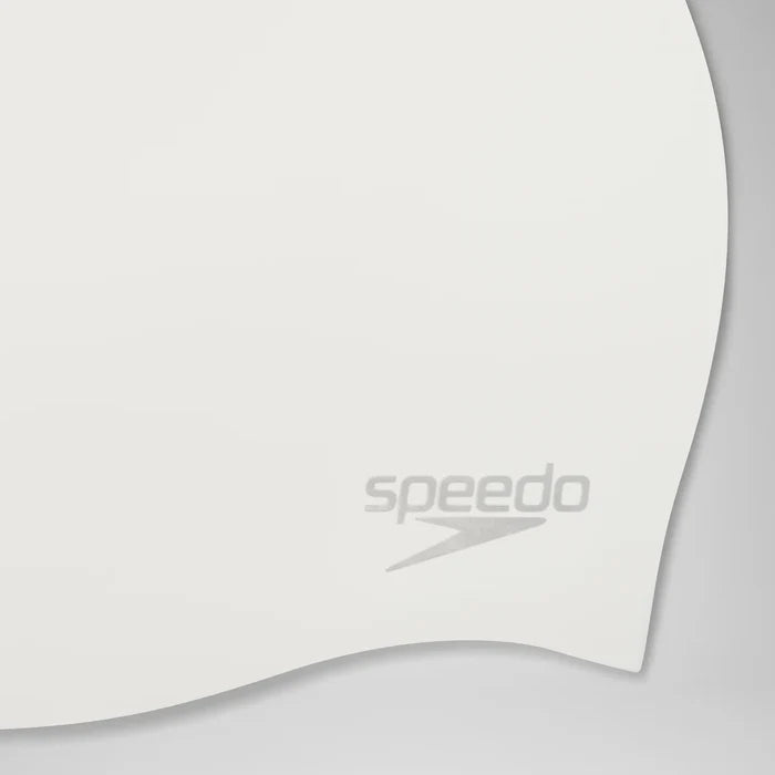 Close-up of a white curved swim cap with the gray Speedo logo near the lower center, shown on a light gray background.