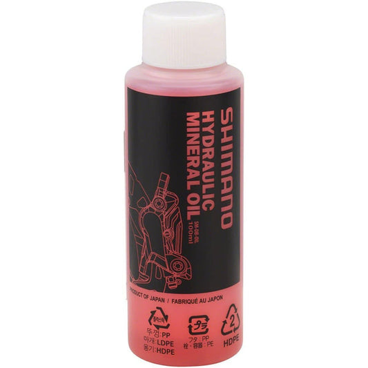 Shimano hydraulic mineral oil bottle on a white background