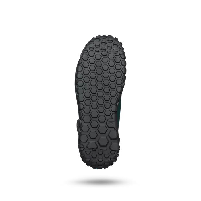 Black sole of a shoe with a textured pattern on a white background