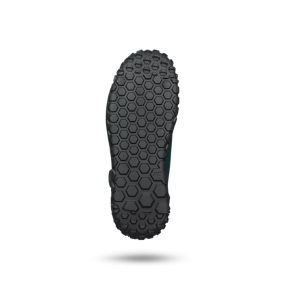 Black sole of a shoe with a textured pattern on a white background