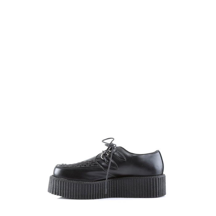 inner side view of black vegan leather 2" platform with hidden coffin shaped sole compartment
