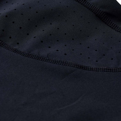 Close-up of black fabric with a subtle pattern